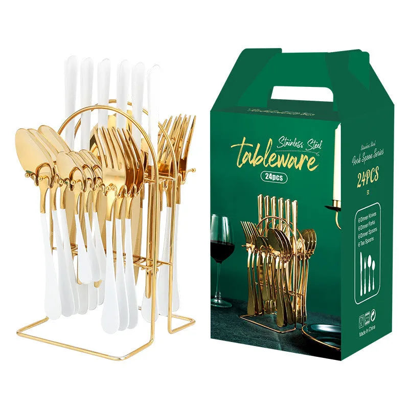24-piece stainless steel cutlery set with storage rack in gold finish showing knives, forks, spoons