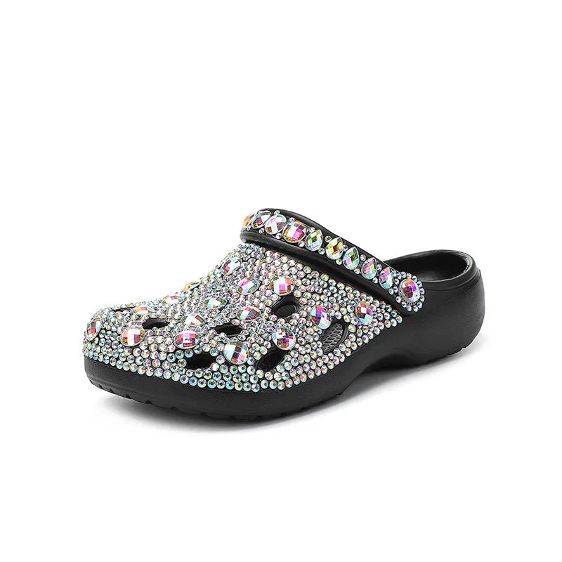 Black women's platform sandals with rhinestone detail on EVA upper and thick sole.