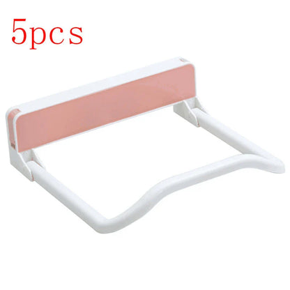 Folding storage rack with non-marking stickers in pink, blue, and grey