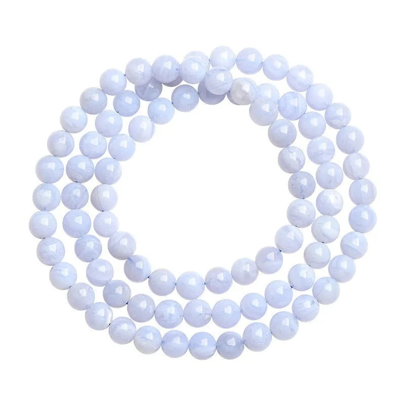 Original unisex blue agate beaded bracelet with natural striped patterns and ruyi elements.