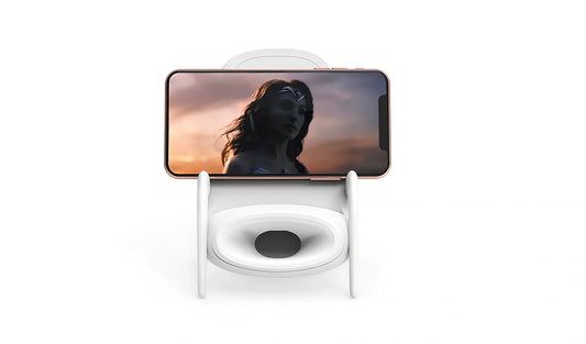 Black amplified wireless charger with bracket, 9.8 x 9.8 x 14.2 cm, for phone charging and audio boost