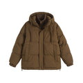 Loose beige winter cotton-padded coat with side pockets on a hanger