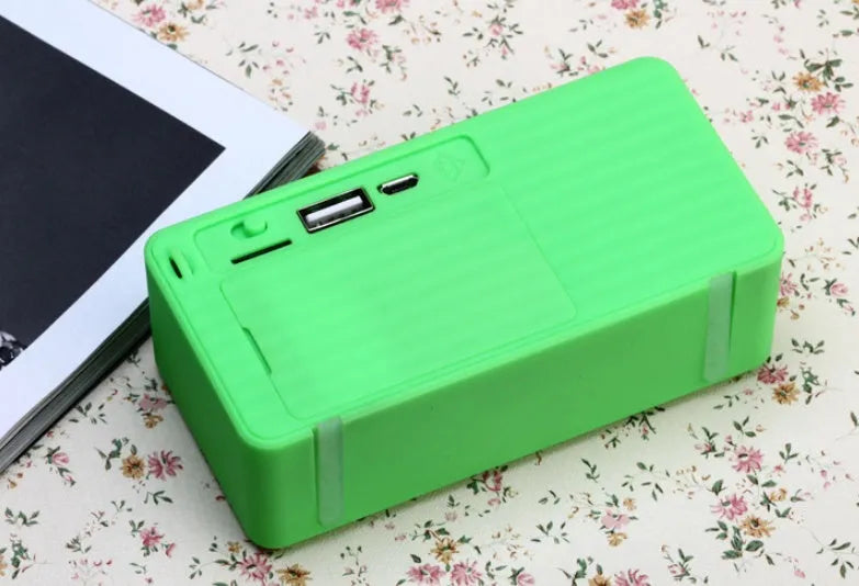 Cannon X3 cube-shaped wireless Bluetooth speaker with card magic design in black, blue, green, red or yellow