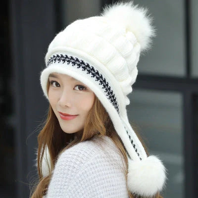 Knit fleece beanie with ear flaps and pompom in various colours for winter warmth