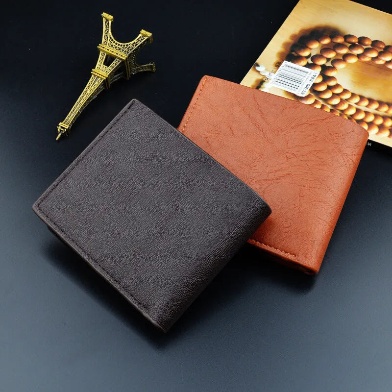 Compact PU bifold wallet in black with multiple card slots and zippered coin pocket