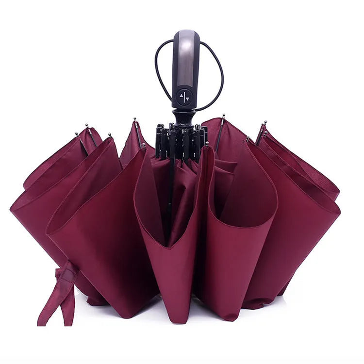 Black triple-folding automatic business umbrella with 10 ribs, shown open.