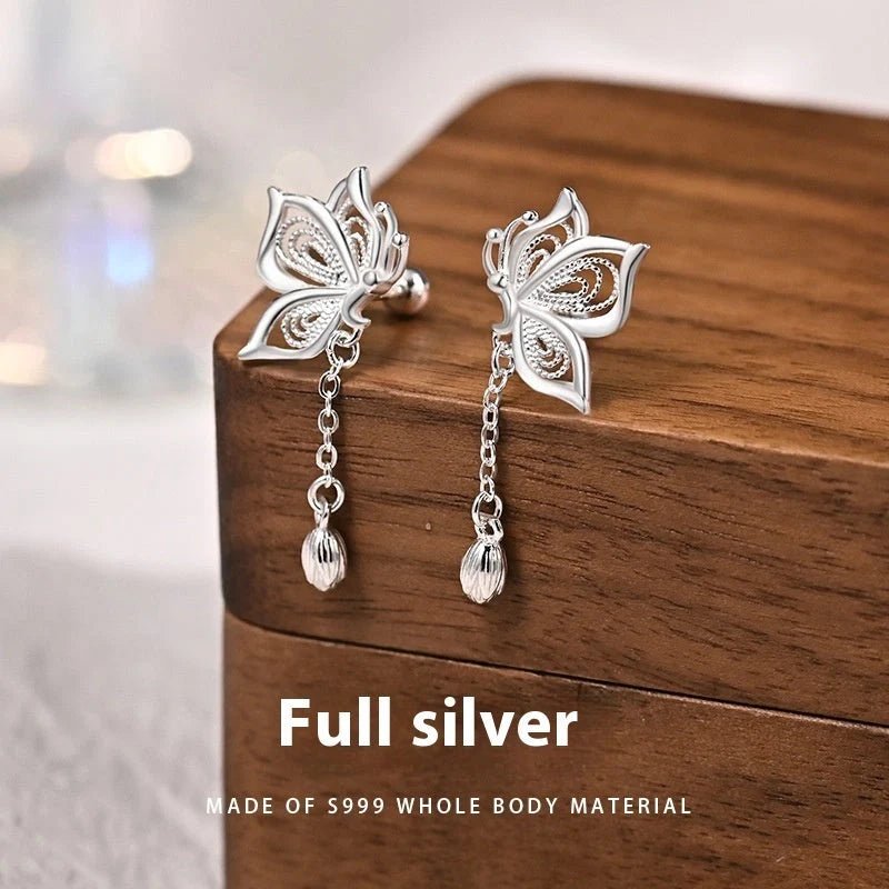 Women's S999 Sterling Silver Butterfly Tassel Earrings showcasing intricate design and shine