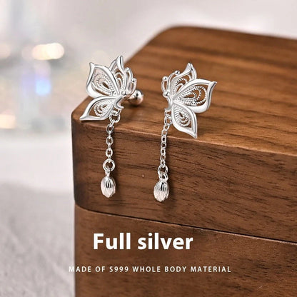 Women's S999 Sterling Silver Butterfly Tassel Earrings showcasing intricate design and shine