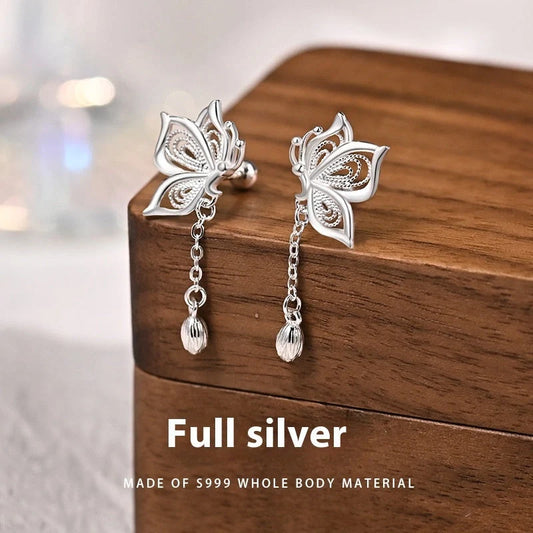 Women's S999 Sterling Silver Butterfly Tassel Earrings showcasing intricate design and shine