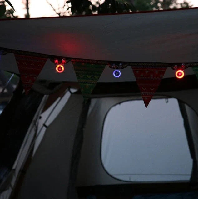 Camping safety light measuring 5.8x3.5x6cm with LED illumination and press switch