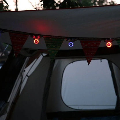 Camping safety light measuring 5.8x3.5x6cm with LED illumination and press switch