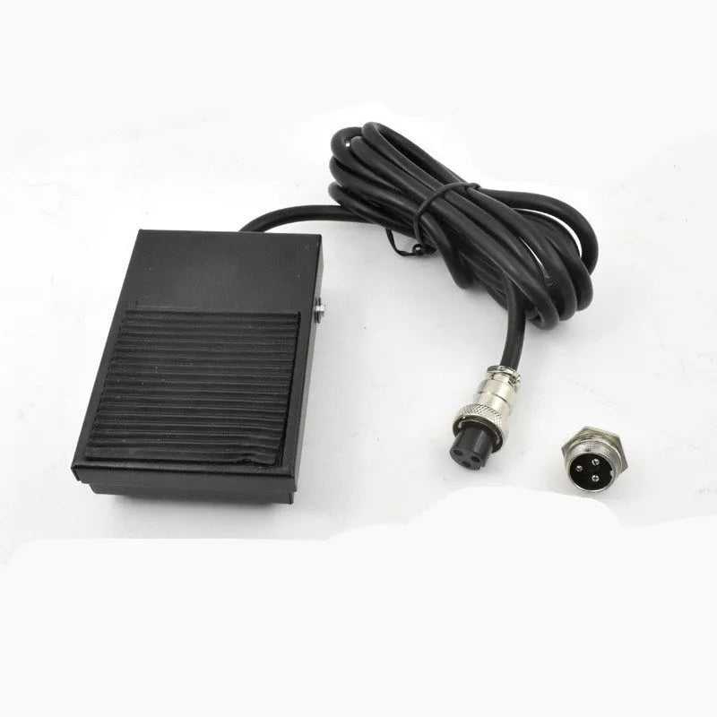 Metal welding foot switch pedal with black rubber top and a 1.8 metre long grey cable attached