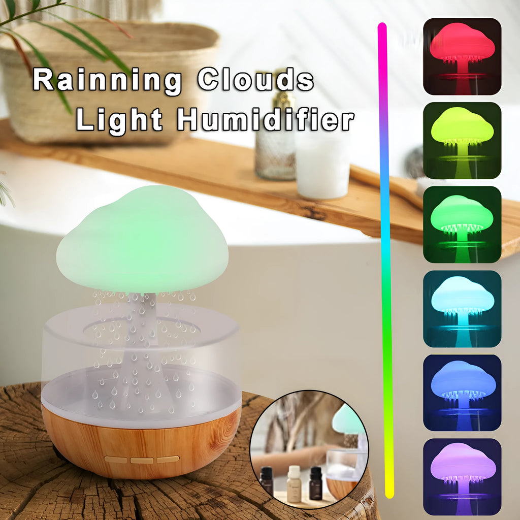 White cloud-shaped humidifier with night light and water drop effect on a table