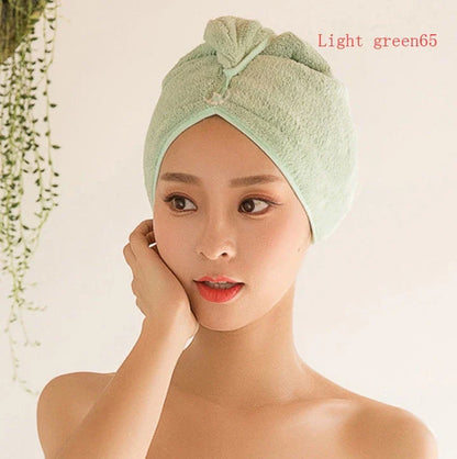 Absorbent microfiber hair turban in various vibrant colours, designed for fast and convenient drying