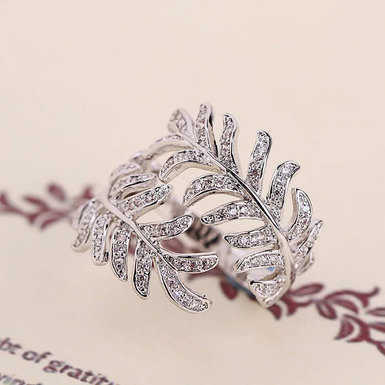 Set of two adjustable mimosa leaves rings in gold and silver alloy metal
