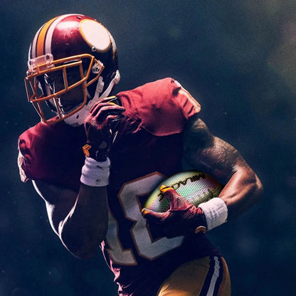 Luminous Rugby Reflective Training Ball in action under night conditions