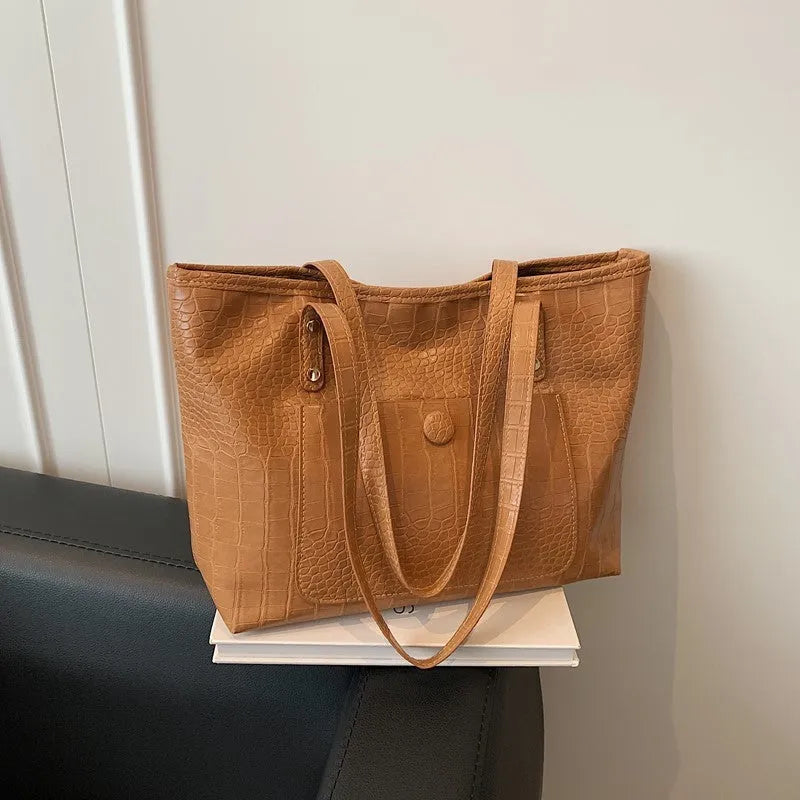 Retro large capacity single-shoulder handbag in soft PU with stitching details, available in black, tan, brown, coffee colours