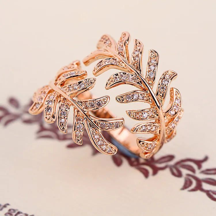 Set of two adjustable mimosa leaves rings in gold and silver alloy metal