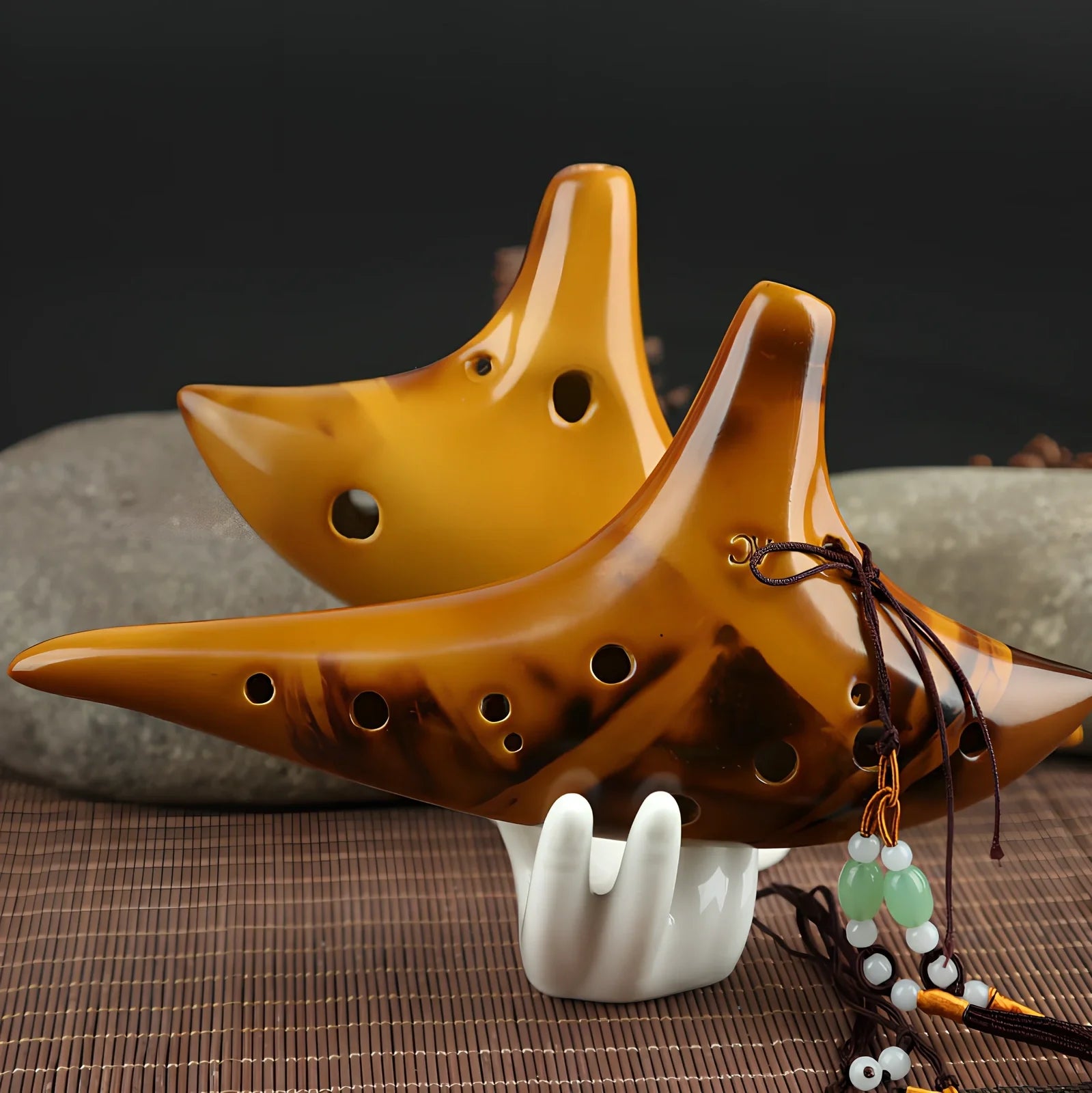 Yellow 12-hole ceramic ocarina in Alto C with 13-note range and integrated lanyard