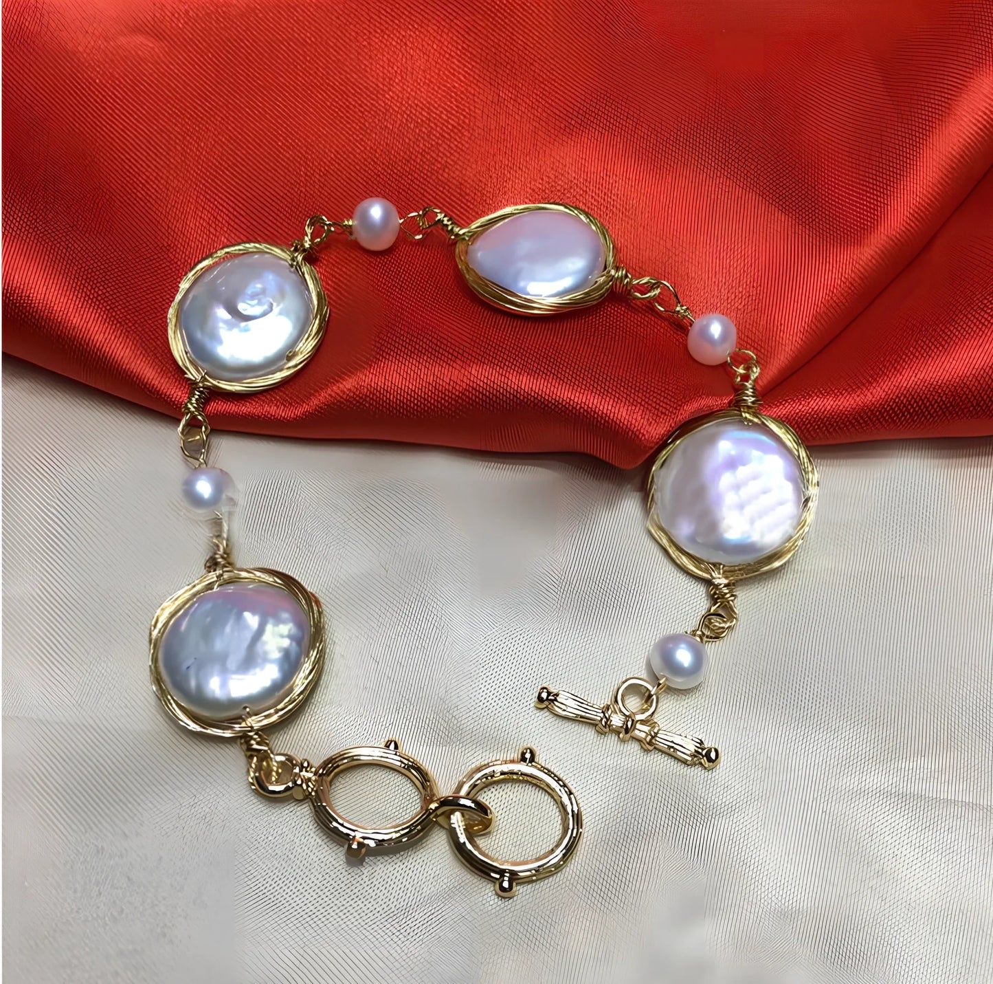 14K gold bracelet with 14mm white button freshwater pearls and baroque texture