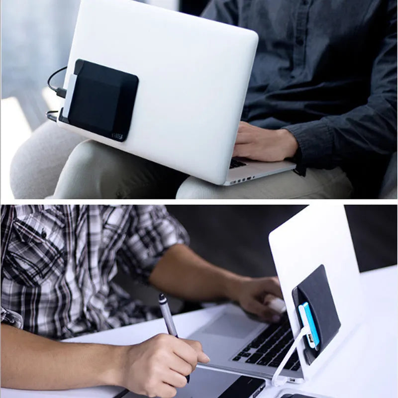 Black adhesive laptop back storage bag with pen loop, 15x12cm, stuck to laptop back