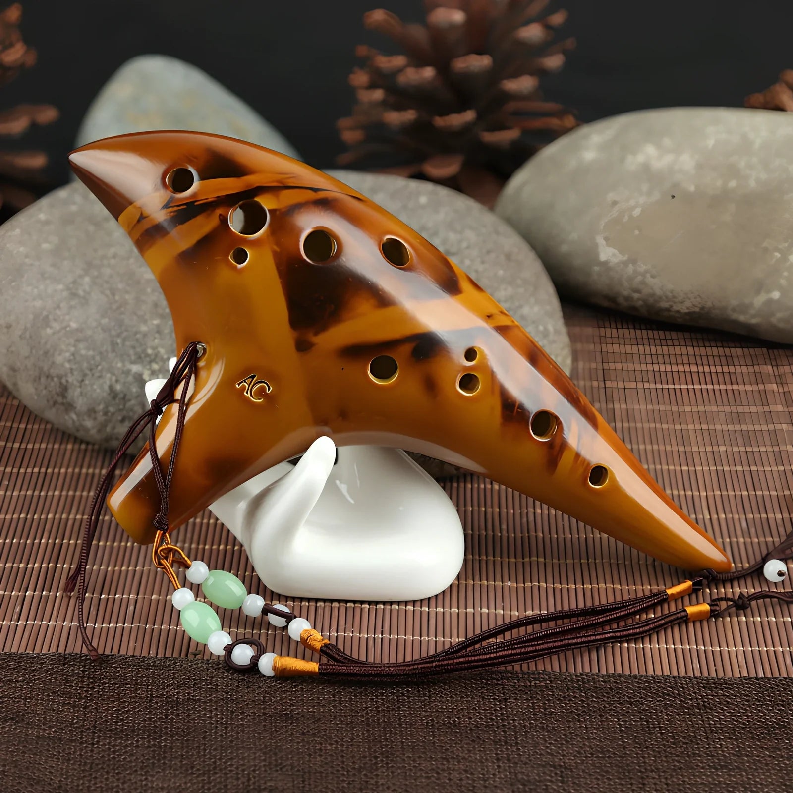 Yellow 12-hole ceramic ocarina in Alto C with 13-note range and integrated lanyard
