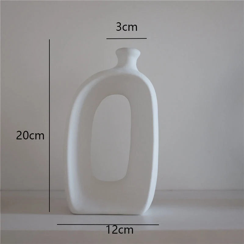 Minimalist ceramic vase set for modern home decoration, perfect for dry flower arrangements.