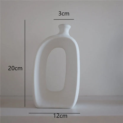 Minimalist ceramic vase set for modern home decoration, perfect for dry flower arrangements.