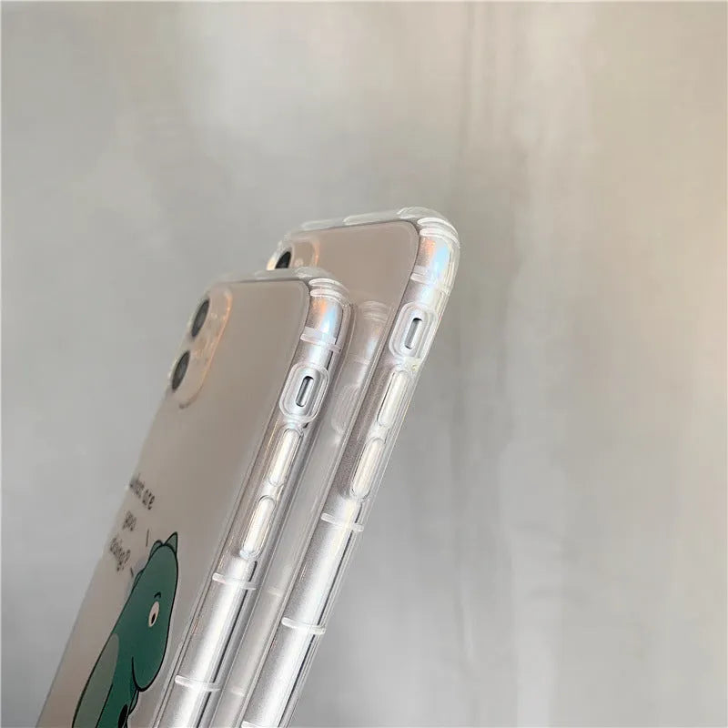 Transparent silicone TPU iPhone case with airbag design and a green dinosaur graphic on the back.