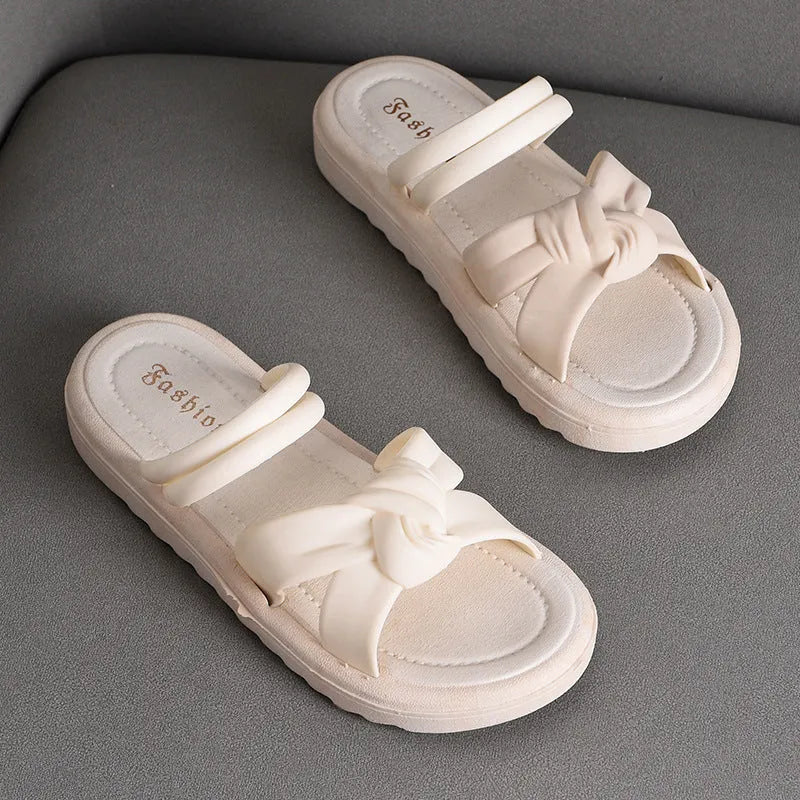 Women's PVC sandals with soft thick back in black and white colour options