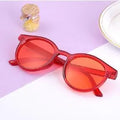 Unisex reading glasses with spring hinge temple in six colours including black, blue, brown, pink, red, and yellow
