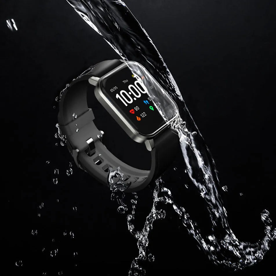 Black waterproof smart bracelet with 1.4-inch screen and silicone strap on a wrist