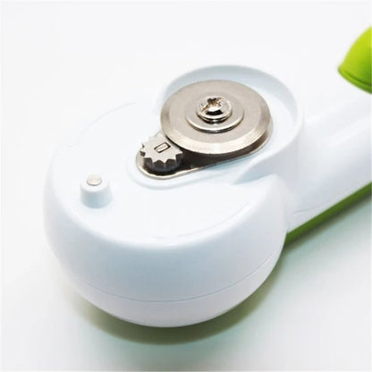 Universal 6-in-1 kitchen tool for opening jars, cans, and bottles in white and green