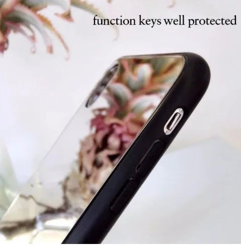 Black iPhone mirror phone case with reflective back cover for iPhone X and other models.