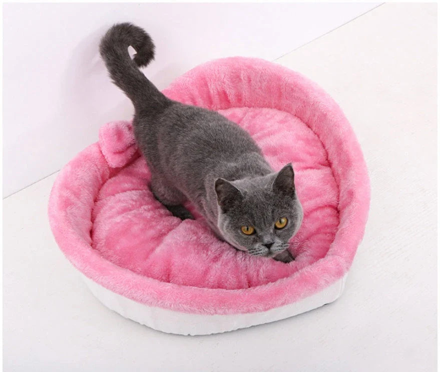 Cozy heart-shaped pet bed in grey and pink colors, designed for small, medium, and large dogs and cats