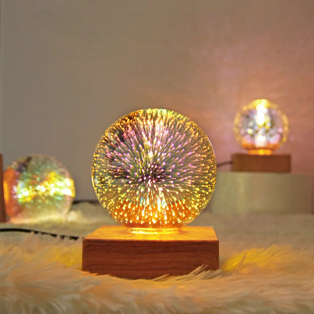 Spherical USB touch control LED night light showing starry sky pattern on a desk.