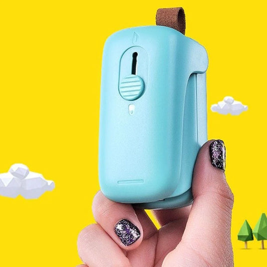 Mini plastic bag sealing machine in blue with open knife and double heating wire