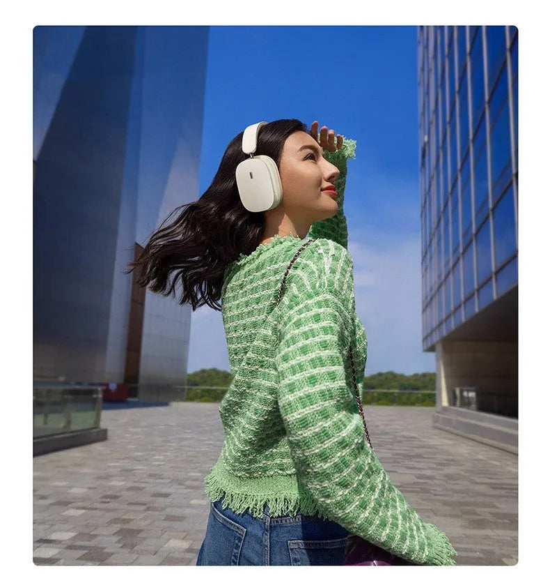 Active noise reduction Bluetooth 5.2 headset in beige with head-mounted design and microphone
