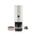 Portable stainless steel coffee machine with car charger, clear spoon, and storage bag in Jungle Green colour.
