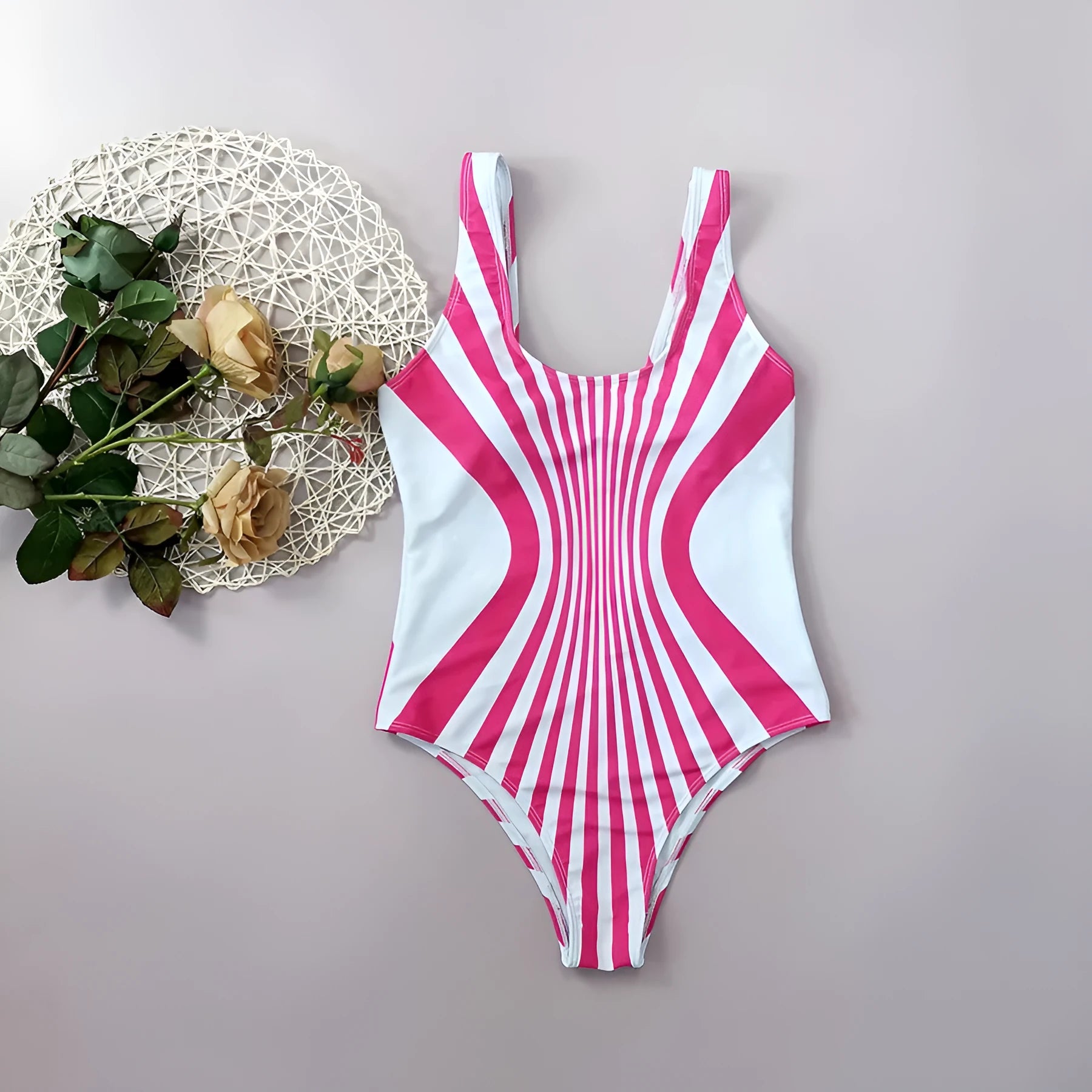 Pink striped digital print women's one-piece swimsuit shown from front and back.