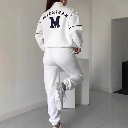 Comfortable and stylish two-piece loungewear set for women, featuring a hoodless pullover sweatshirt and relaxed-fit sweatpants with pockets.