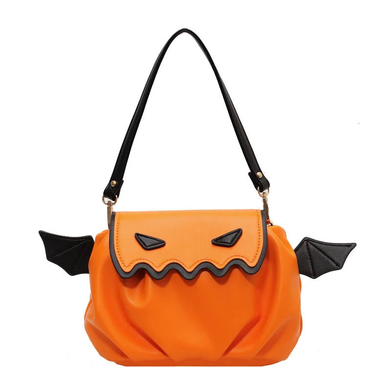 Halloween pumpkin cartoon crossbody bag with wings in black, white, and orange