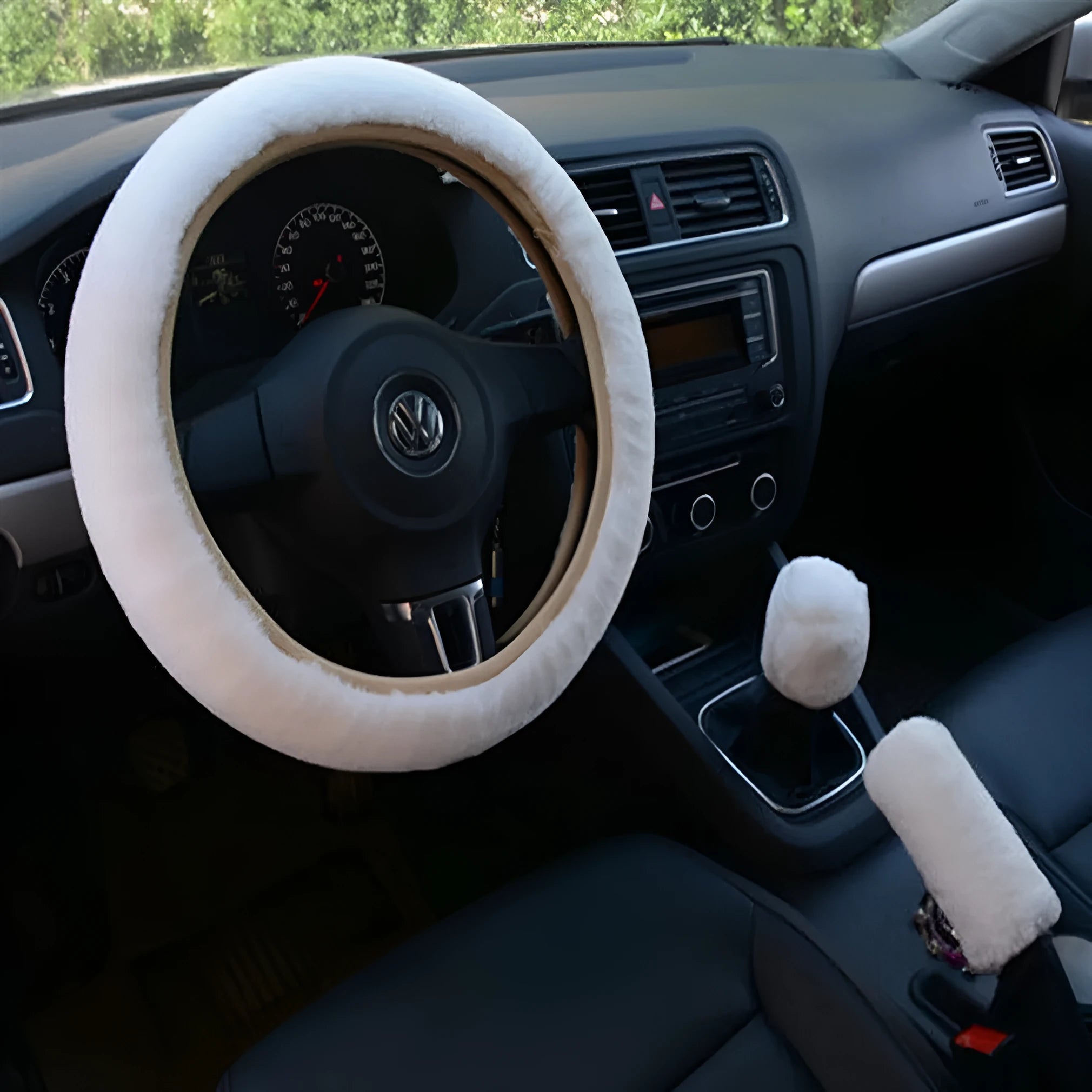 Plush winter car steering wheel cover set in beige, showing steering wheel, handbrake, and gear knob covers