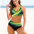 Women's striped tie-dye bikini set with hollow design detail, high-waisted bottoms, and backless top.