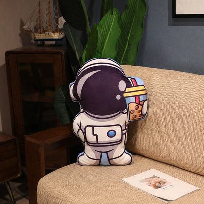 Cozy space-themed plush pillow with astronaut, rocket, and spacecraft motifs for kids