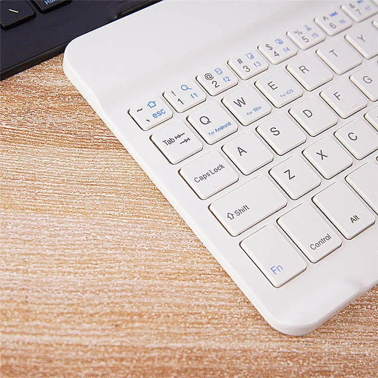 Wireless Bluetooth mini ultra-thin keyboard for laptop, available in black and white, with plug-and-play support
