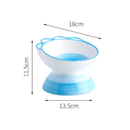 Ceramic pet bowl with cartoon paw design and 15-degree incline for comfortable feeding