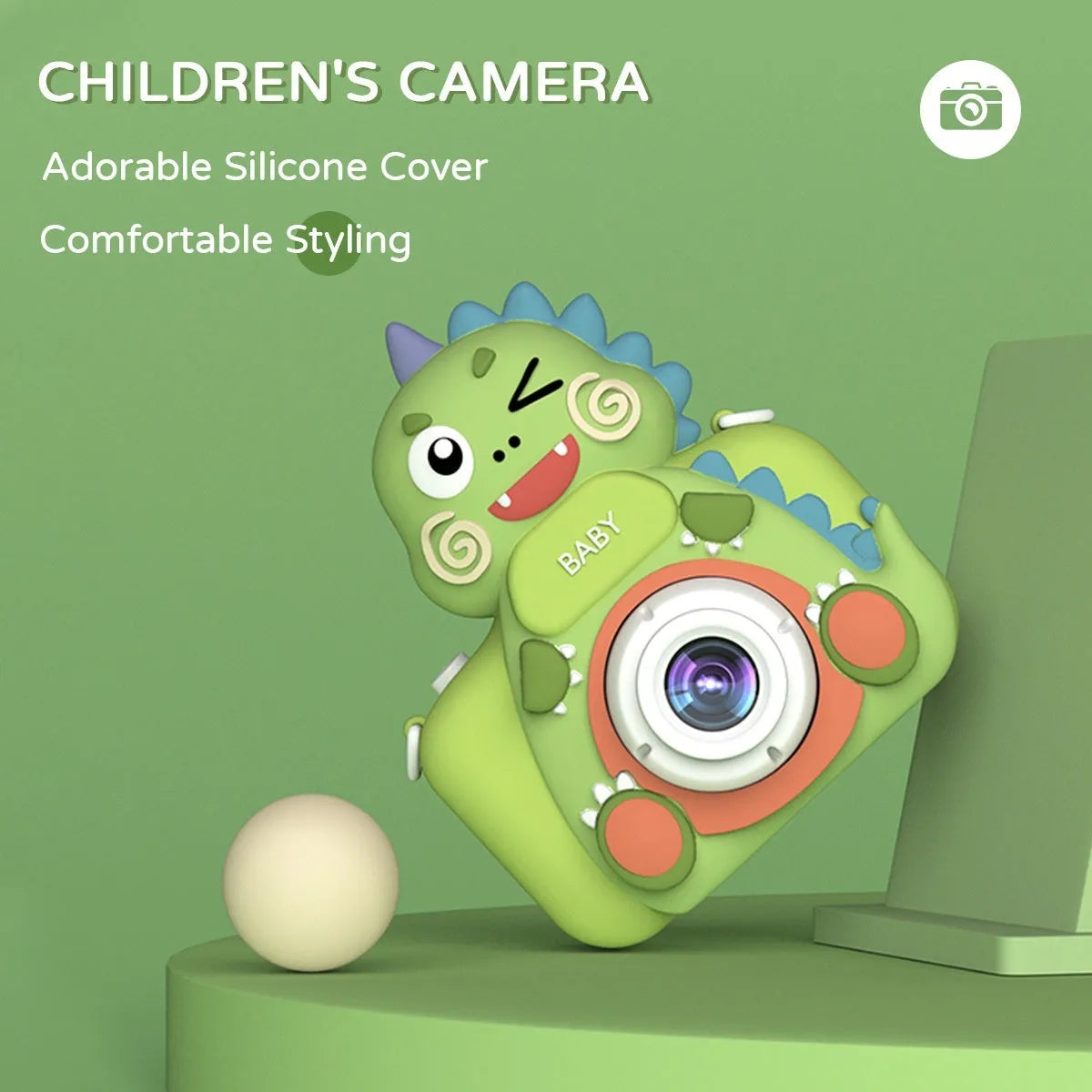 Children's mini cartoon camera with silicone body, Big Head Dinosaur colour, with lanyard and charging cable on white background
