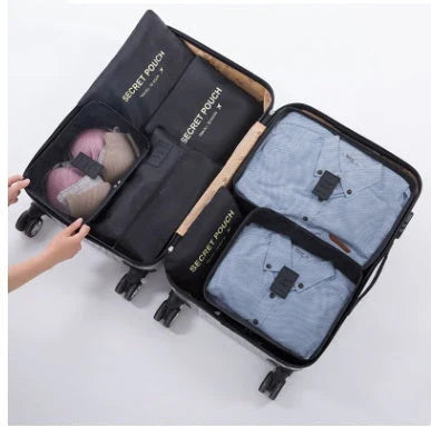 Durable waterproof packing cubes in various colors for organized, efficient travel