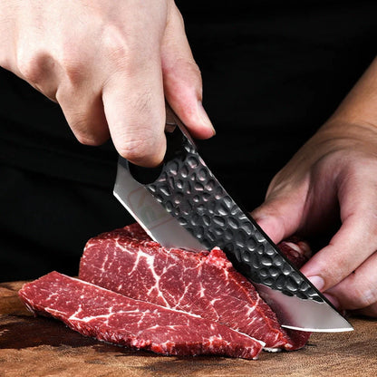 Hand-forged boning knife with walnut handle for precise meat cutting